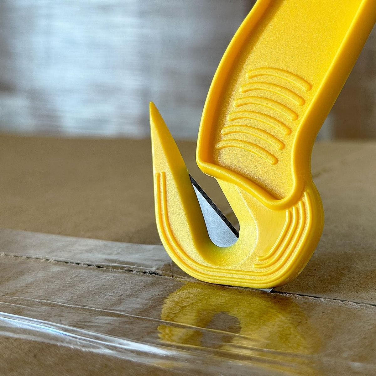 Thornton's Office Supplies Disposable Film Cutter, Sharp & Durable Steel Blade, Safe and Efficient Cutting Design for Shrink Wrap, Stretch Wrap, Tape, and Plastic Straps, Yellow (100)