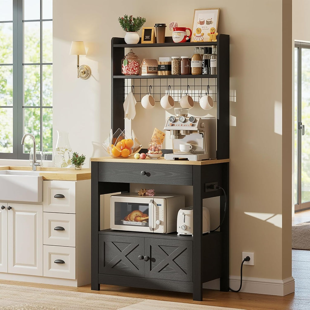 LIKIMIO Baker Rack with Spill-Safe Power Outlet & Drawer, Coffee Bar Cabinet with Storage, Farmhouse Microwave Stand with Hutch and 5 Hooks for Kitchen, Black
